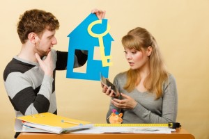 couple calculating how much they need for a down payment for a home in Florida