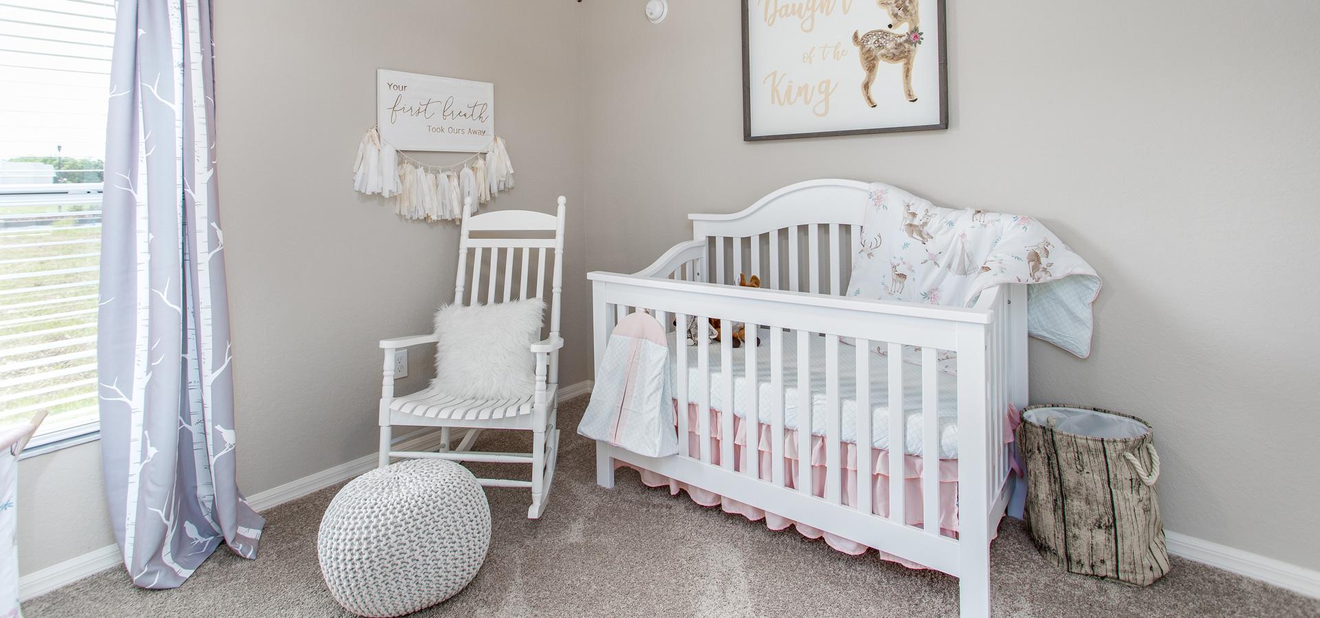 Versatile secondary bedroom turned into nursery in the Raychel, a new home plan by Highland Homes
