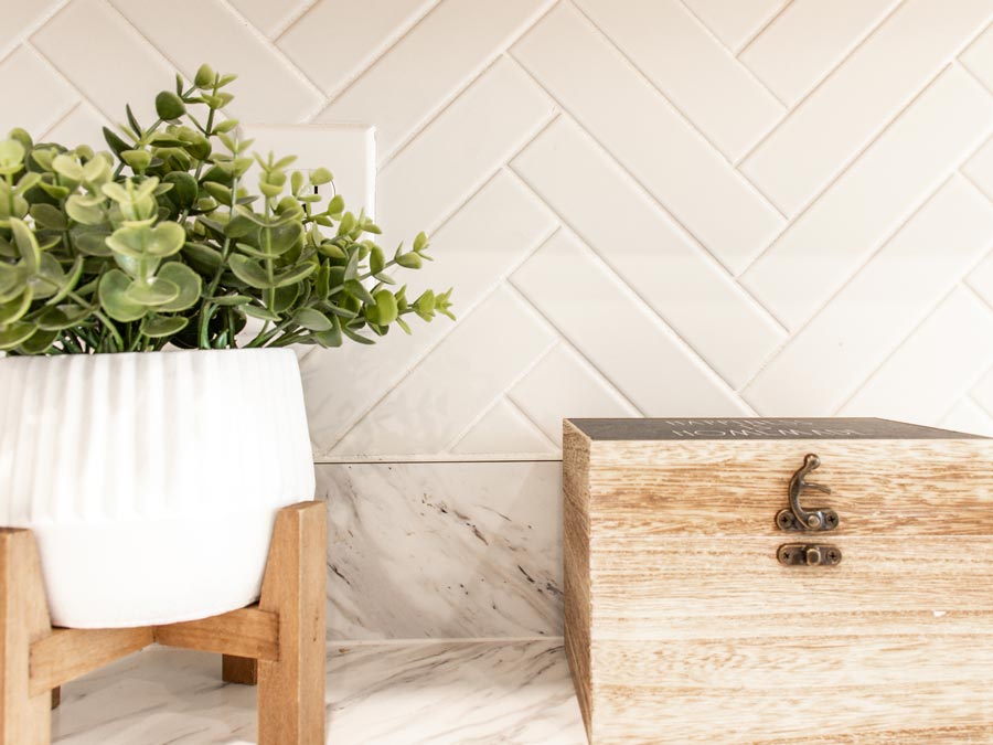 Model home in Davenport, FL with a herringbone mosaic tile backsplash