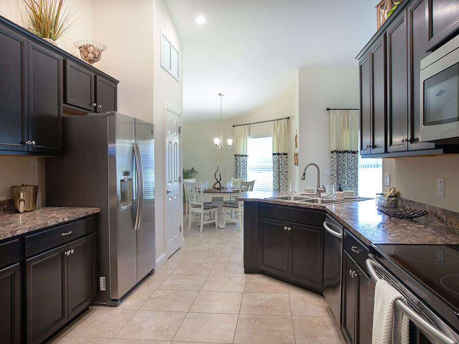 Utility Cabinet with Roll Trays - Aristokraft Cabinetry