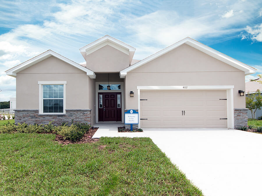 Florida home with a dark red front door