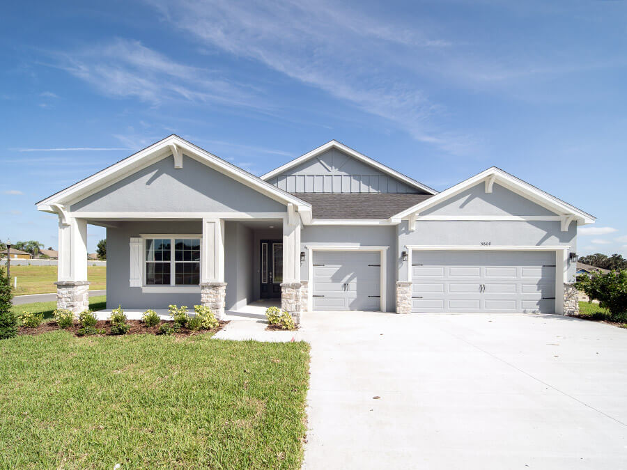 New home with a porch, siding, and corbels for great curb appeal