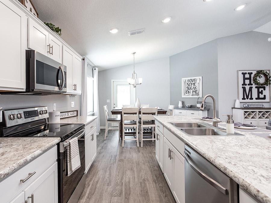 Lighting in the kitchen of the Peyton model home in Davenport, FL